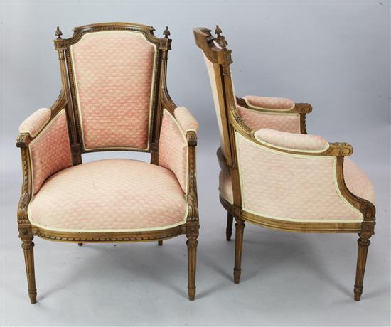 A pair of French walnut fauteuils, H.3ft 3in.